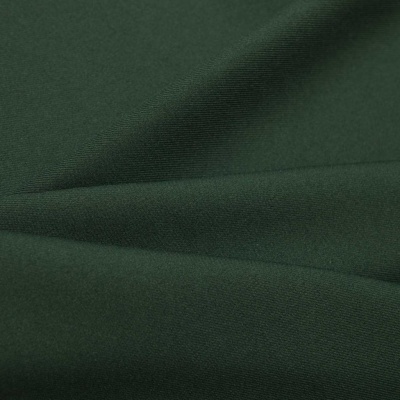 Ткань костюмная 21010 2076, 225 гр/м2, шир.150см, цвет т.зеленый - купить в Каменске-Уральском. Цена 390.73 руб.